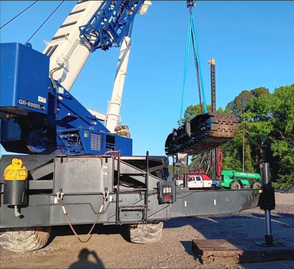 Heavy haul crane lifting oversized industrial equipment