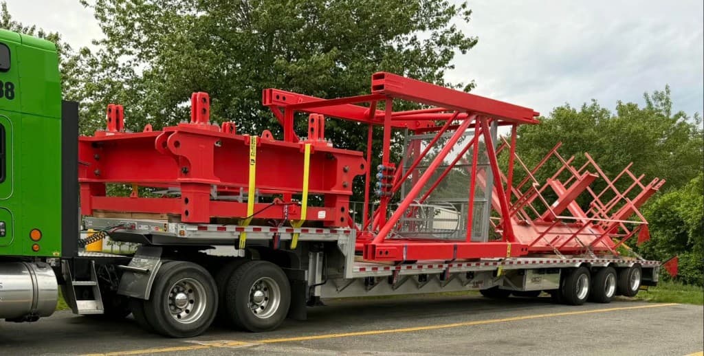 Flatbed semi hauling specialized steel freight